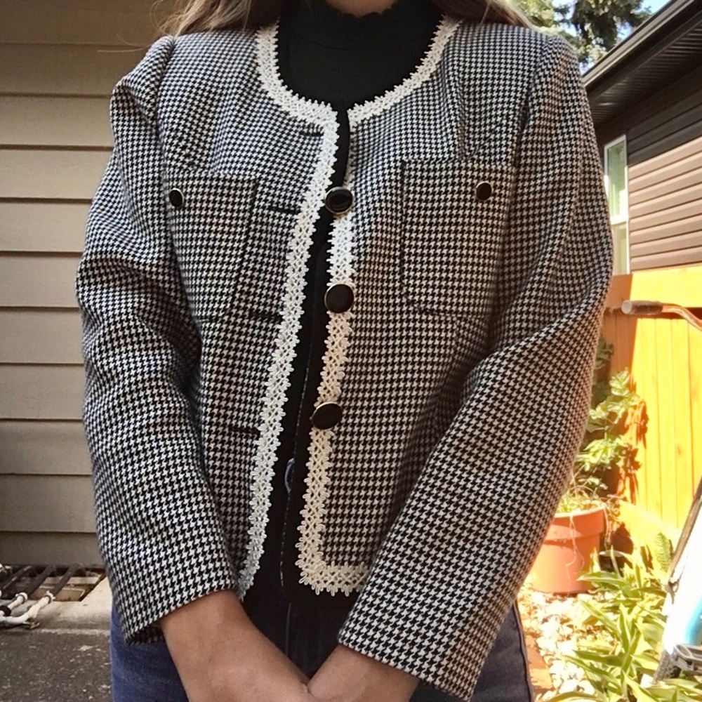 a vintage 80s houndstooth buttoned jacket